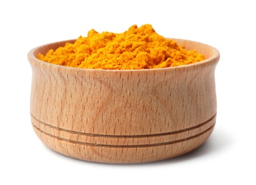 Photo of Wooden bowl with turmeric powder on white background. Different spices