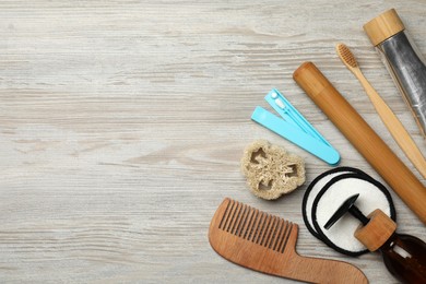 Photo of Flat lay composition with eco friendly products on wooden background, space for text. Conscious consumption