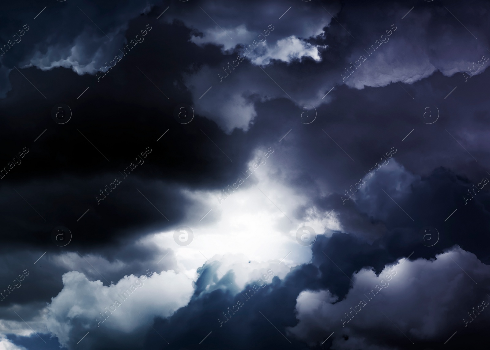 Image of Beautiful view of sky covered with grey thunderclouds