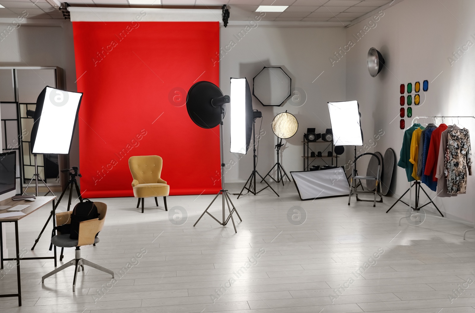 Photo of Interior of modern photo studio with professional equipment