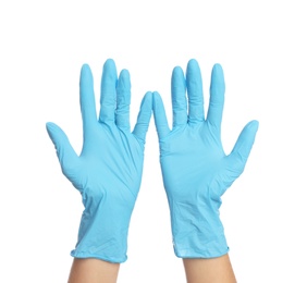 Photo of Doctor wearing medical gloves on white background, closeup