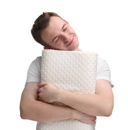Photo of Man with orthopedic pillow on white background