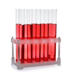 Photo of Test tubes with red liquid on white background. Laboratory glassware