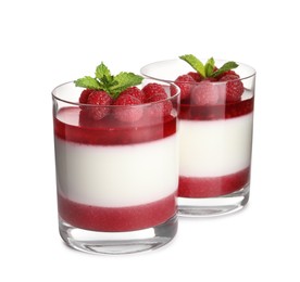 Photo of Delicious panna cotta with raspberry coulis and fresh berries on white background