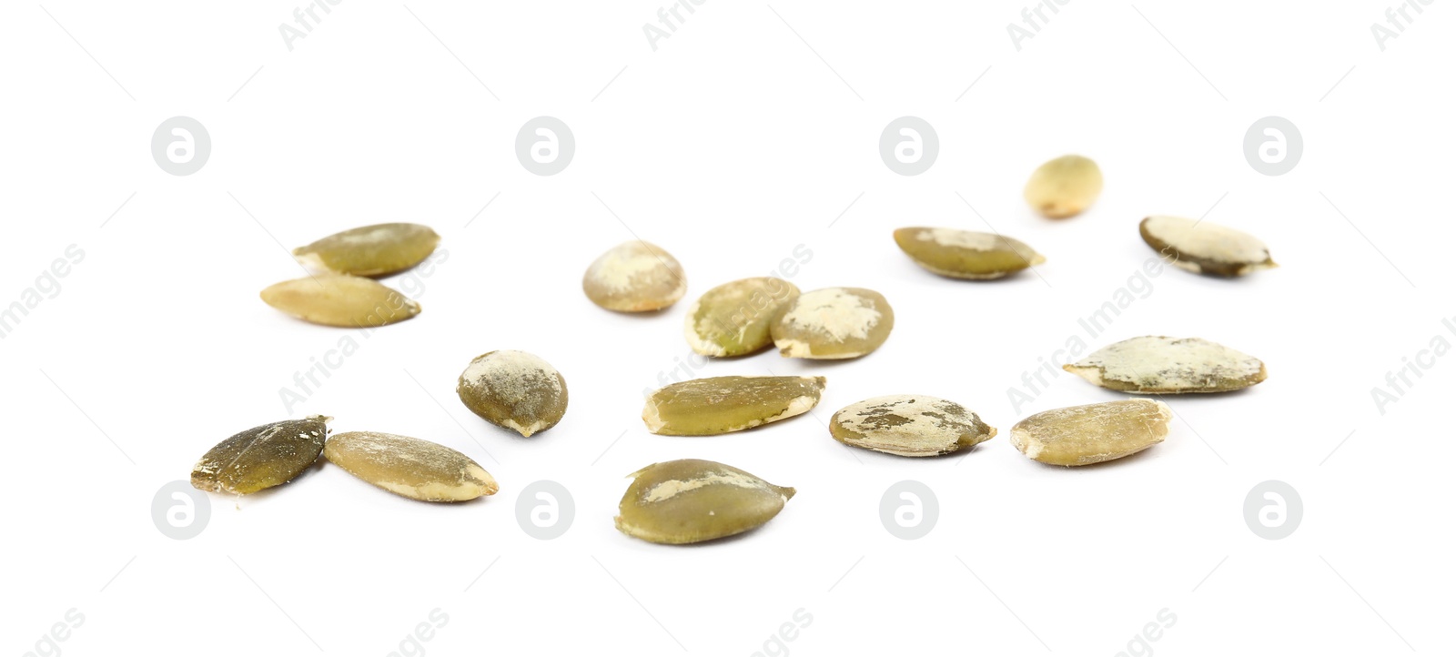 Photo of Raw peeled pumpkin seeds on white background