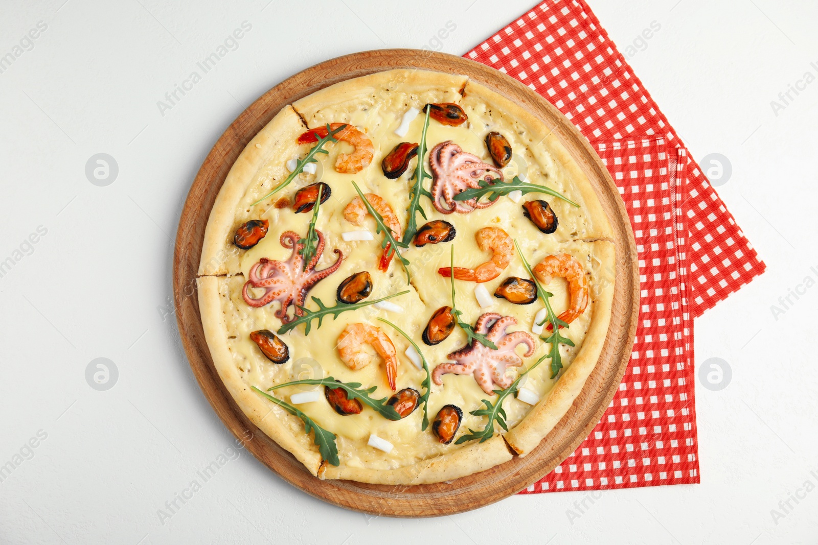 Photo of Delicious seafood pizza on white background, top view