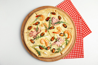 Photo of Delicious seafood pizza on white background, top view