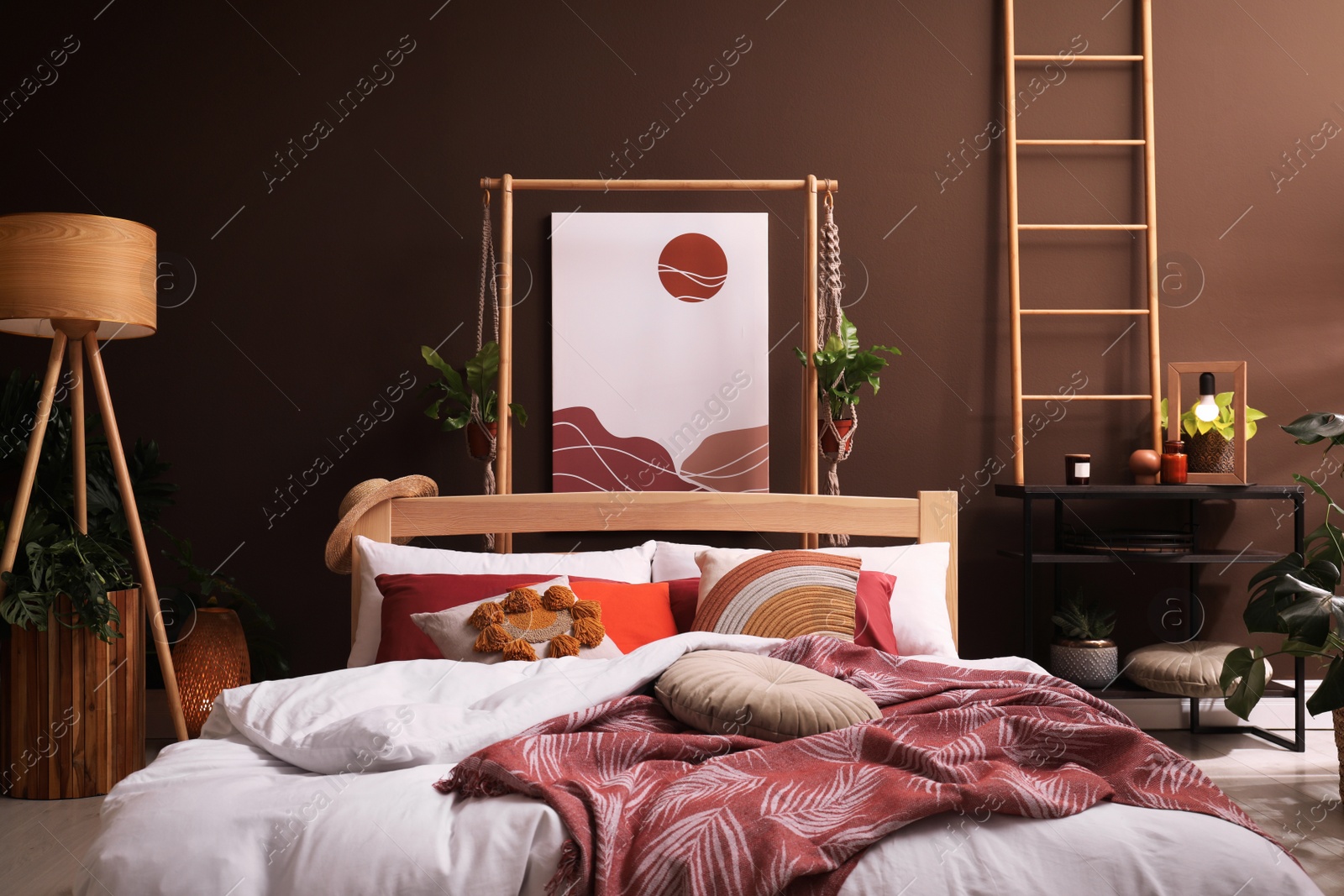 Photo of Modern interior of stylish room with large comfortable bed