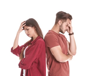 Photo of Upset young couple on white background. Relationship problems