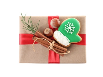 Christmas gift box with decoration on white background, top view