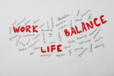 Photo of Word cloud on white background. Life and work balance concept