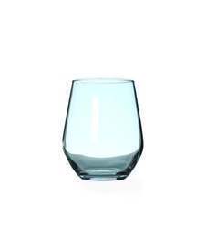 Photo of New empty clear glass on blue background