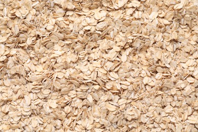 Photo of Top view of rolled oats as background