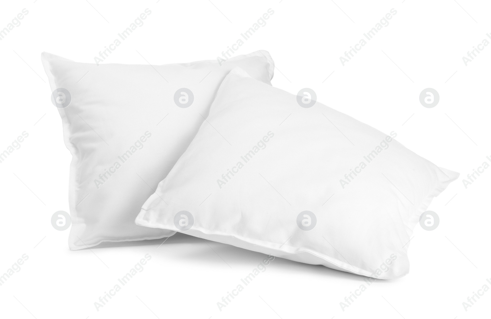 Photo of Two new soft pillows isolated on white