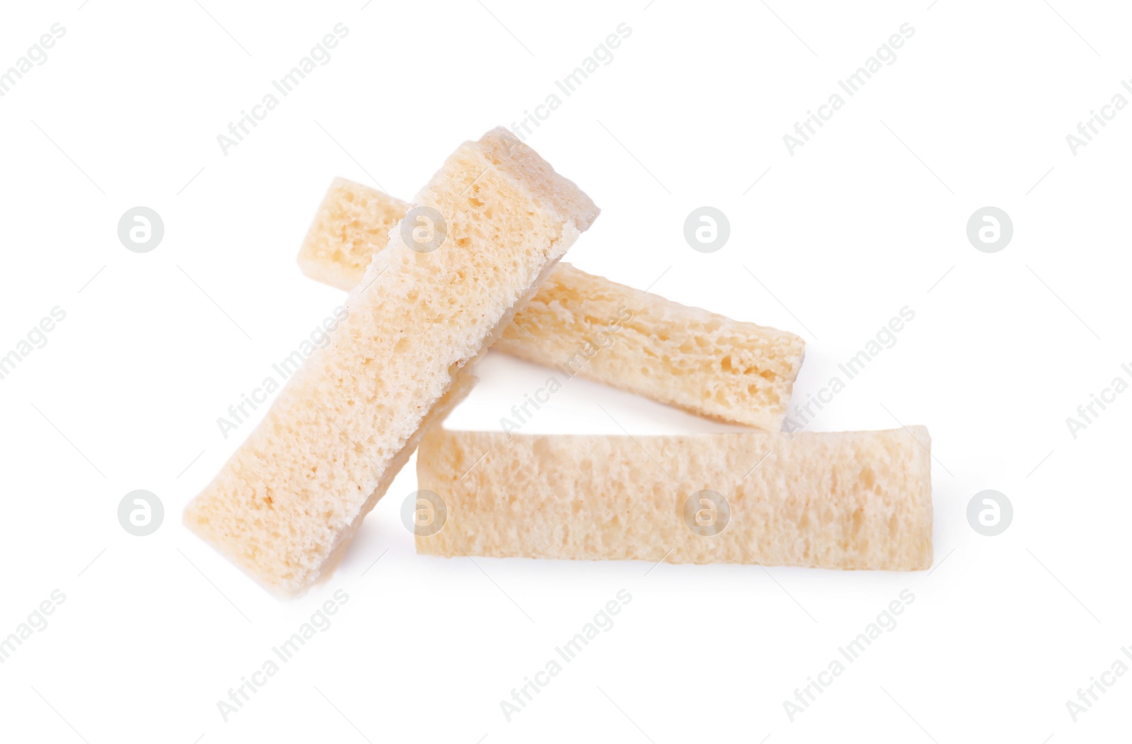 Photo of Crispy rusks on white background, top view