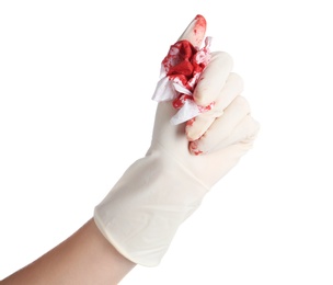 Doctor in medical glove holding tissue with blood on white background