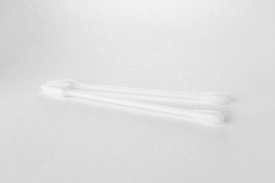 Clean cotton buds isolated on white. Hygienic product