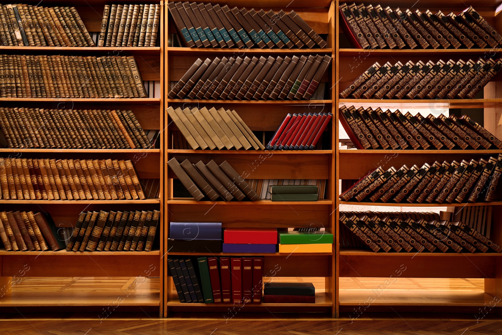 Image of Collection of different books on shelves in library