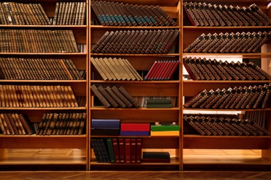 Collection of different books on shelves in library