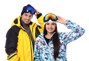 Photo of Couple wearing stylish winter sport clothes on white background