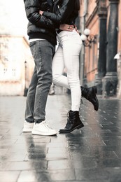 Lovely young couple enjoying time together outdoors, closeup. Romantic date