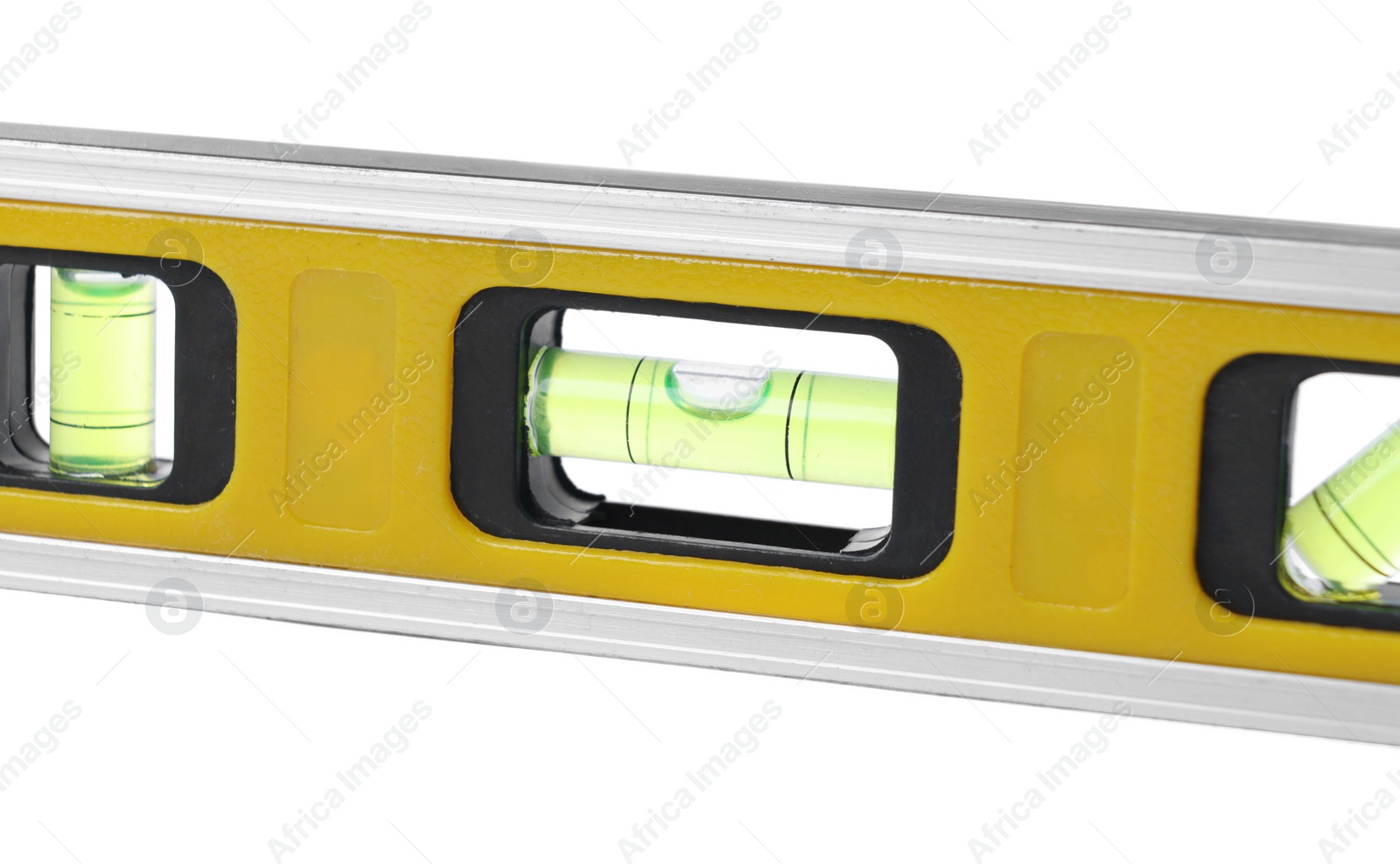 Photo of Yellow building level isolated on white. Construction tool