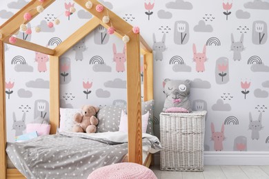 Image of Modern room interior for child with comfortable bed and cute wallpapers