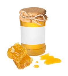 Image of Sweet honey in glass jar with blank label and pieces of honeycomb on white background. Mockup for design