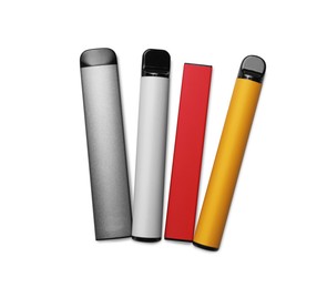 Different electronic cigarettes on white background, top view