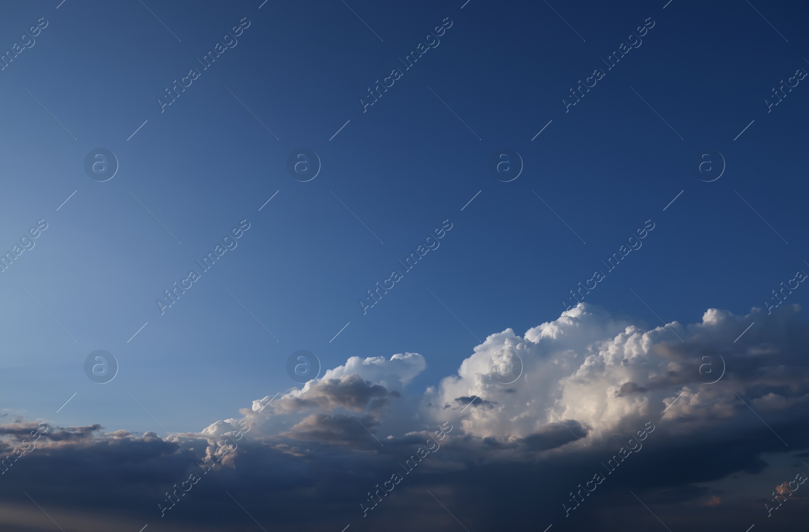 Photo of Picturesque view of beautiful blue sky with fluffy white clouds