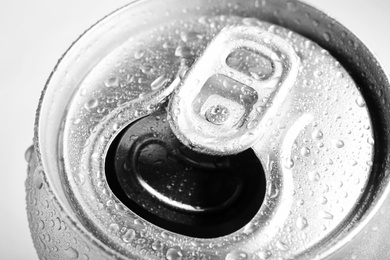 Photo of Wet open can with cold drink, closeup