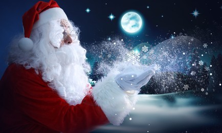 Image of Santa Claus blowing snow in winter forest. Christmas magic
