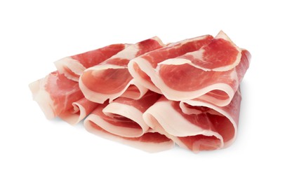 Slices of delicious jamon on white background