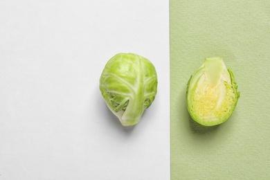 Tasty fresh Brussels sprouts on color background, top view. Space for text