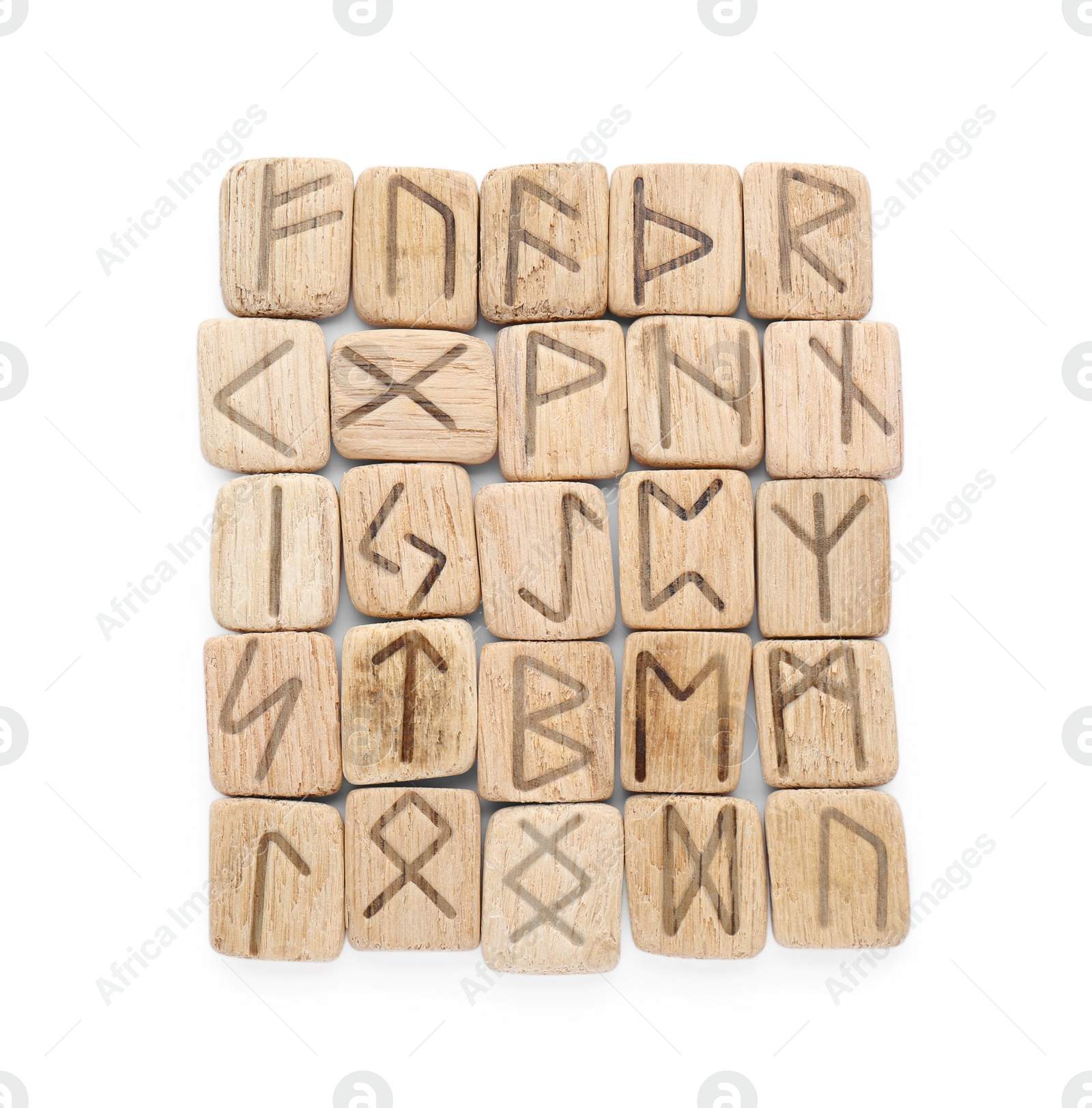 Photo of Many wooden runes isolated on white, top view