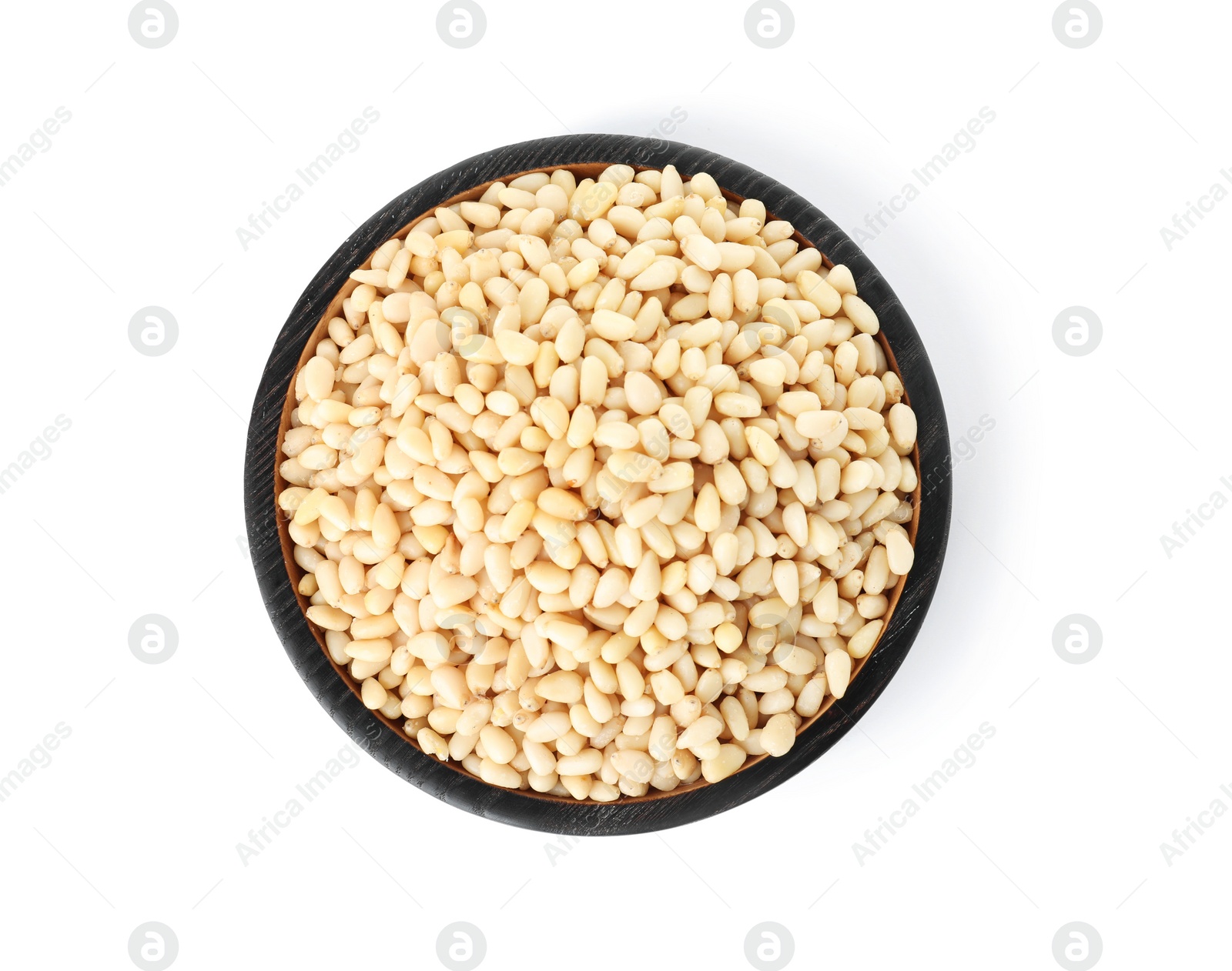 Photo of Plate with pine nuts on white background, top view