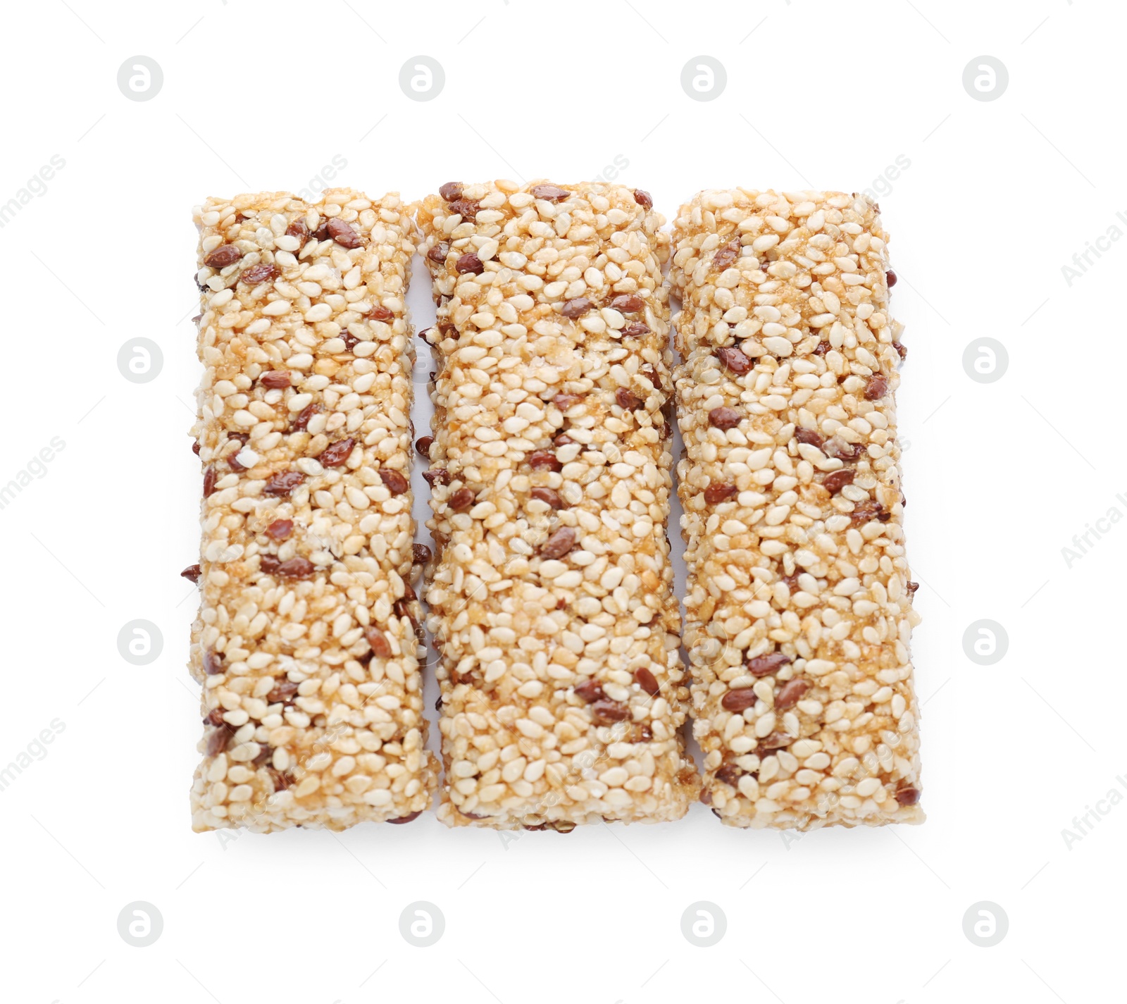 Photo of Tasty sesame seed bars isolated on white