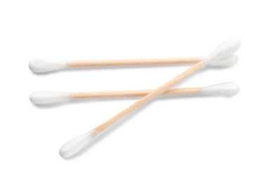 Photo of Wooden cotton swabs on white background. Hygienic accessory