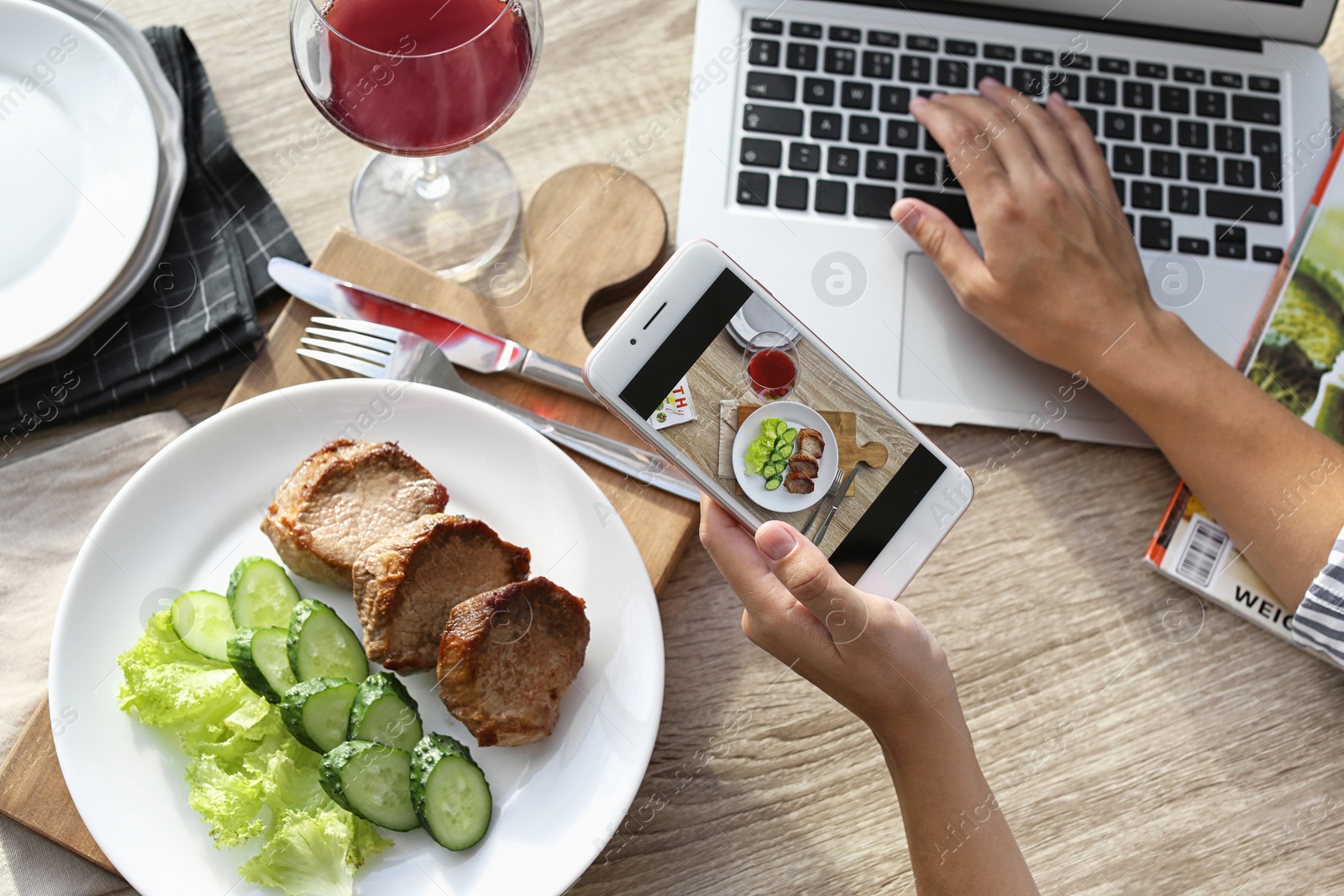 Photo of Blogger taking photo of food with mobile phone, closeup