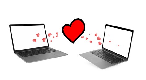 Image of Love in long distance relationship. Many hearts between laptops on white background