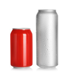 Photo of Aluminum cans with drinks on white background