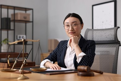 Photo of Portrait of notary at table in office