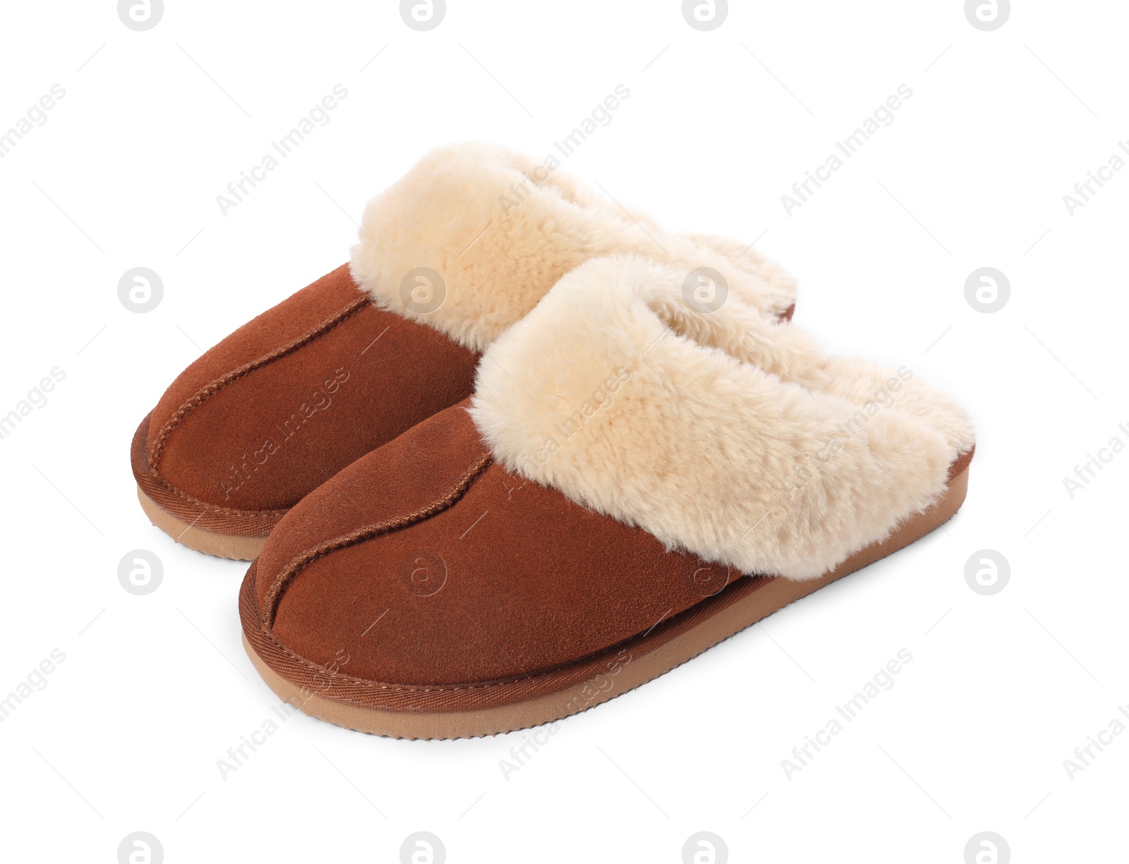 Photo of Pair of soft slippers with fur isolated on white