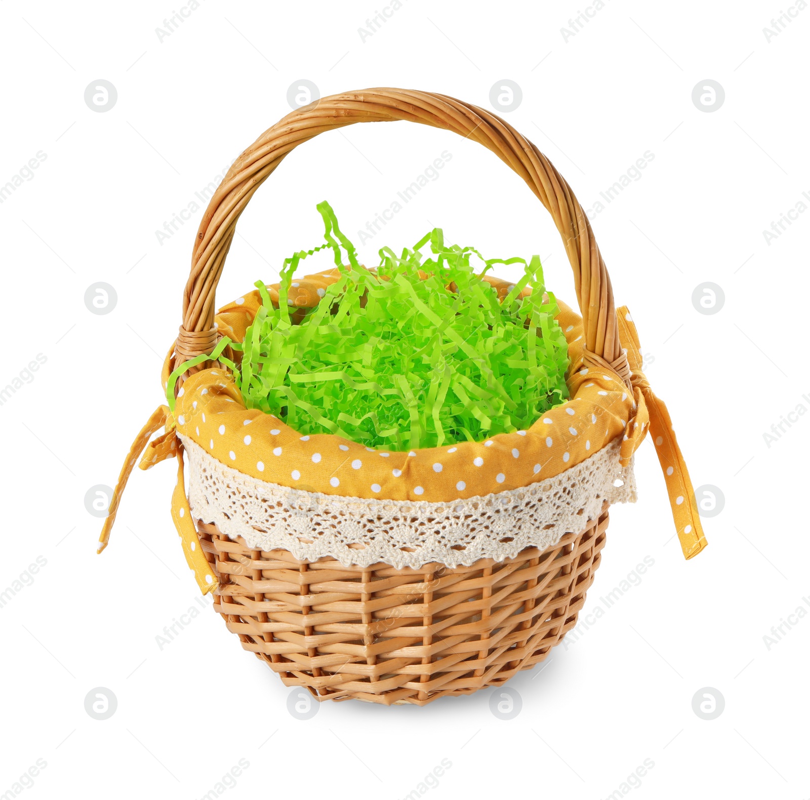 Photo of Easter wicker basket with decorated grass isolated on white