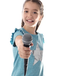 Photo of Cute girl with microphone on white background