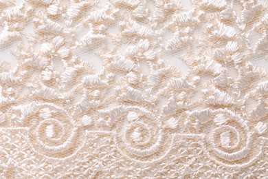 Beautiful beige lace as background, top view