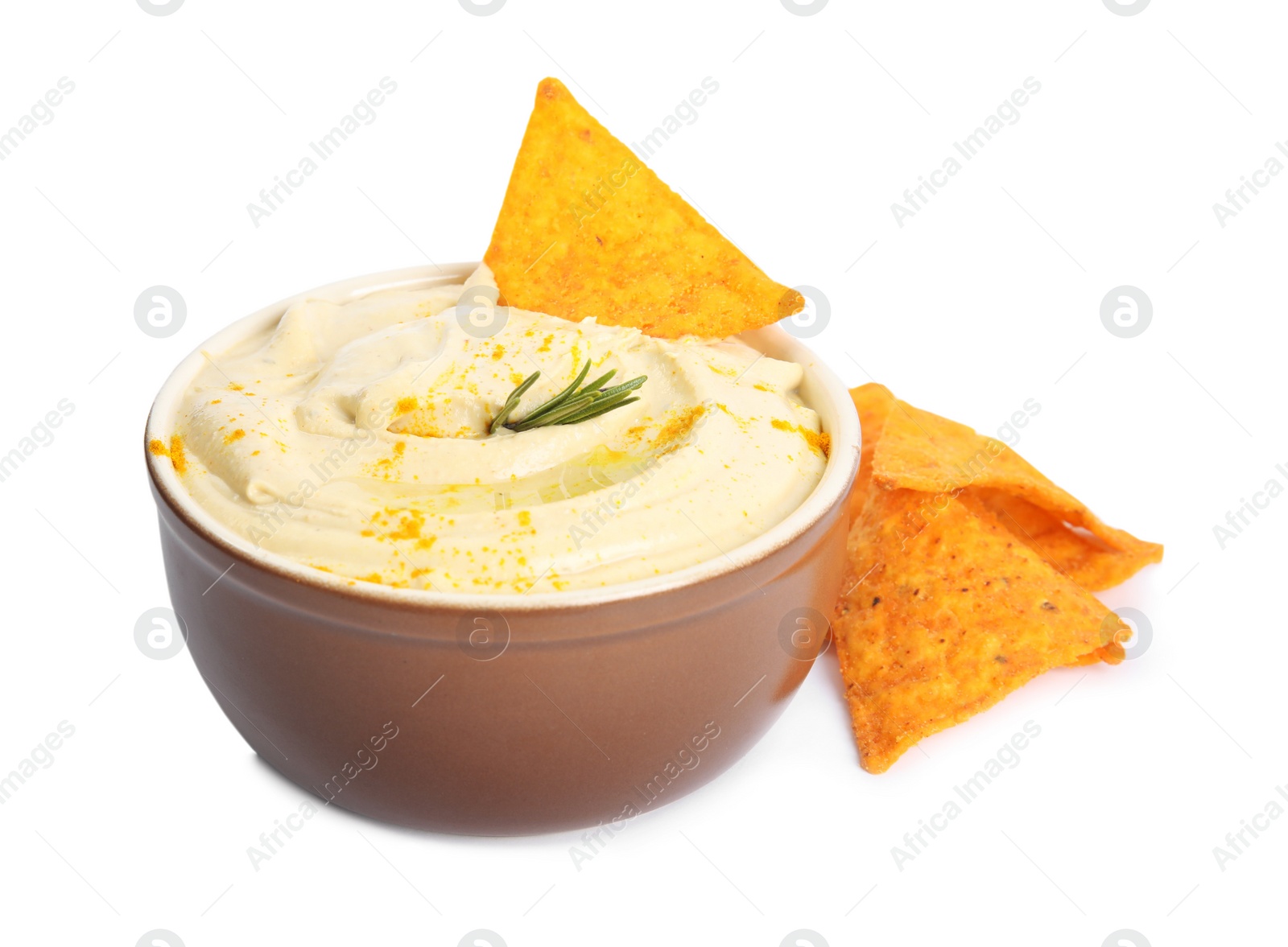 Photo of Delicious hummus with nachos and rosemary on white background