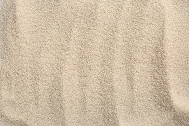 Uncooked organic semolina as background, top view