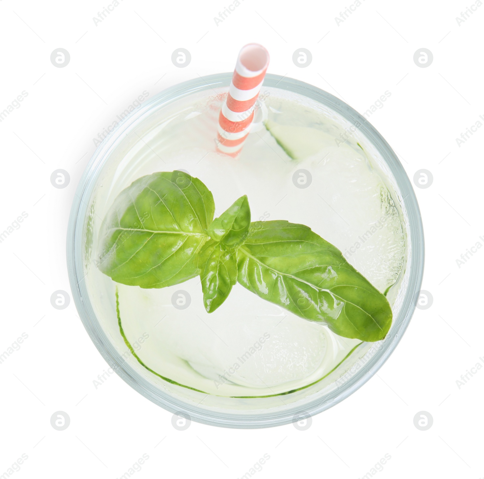 Photo of Refreshing cucumber water with basil in glass isolated on white, top view