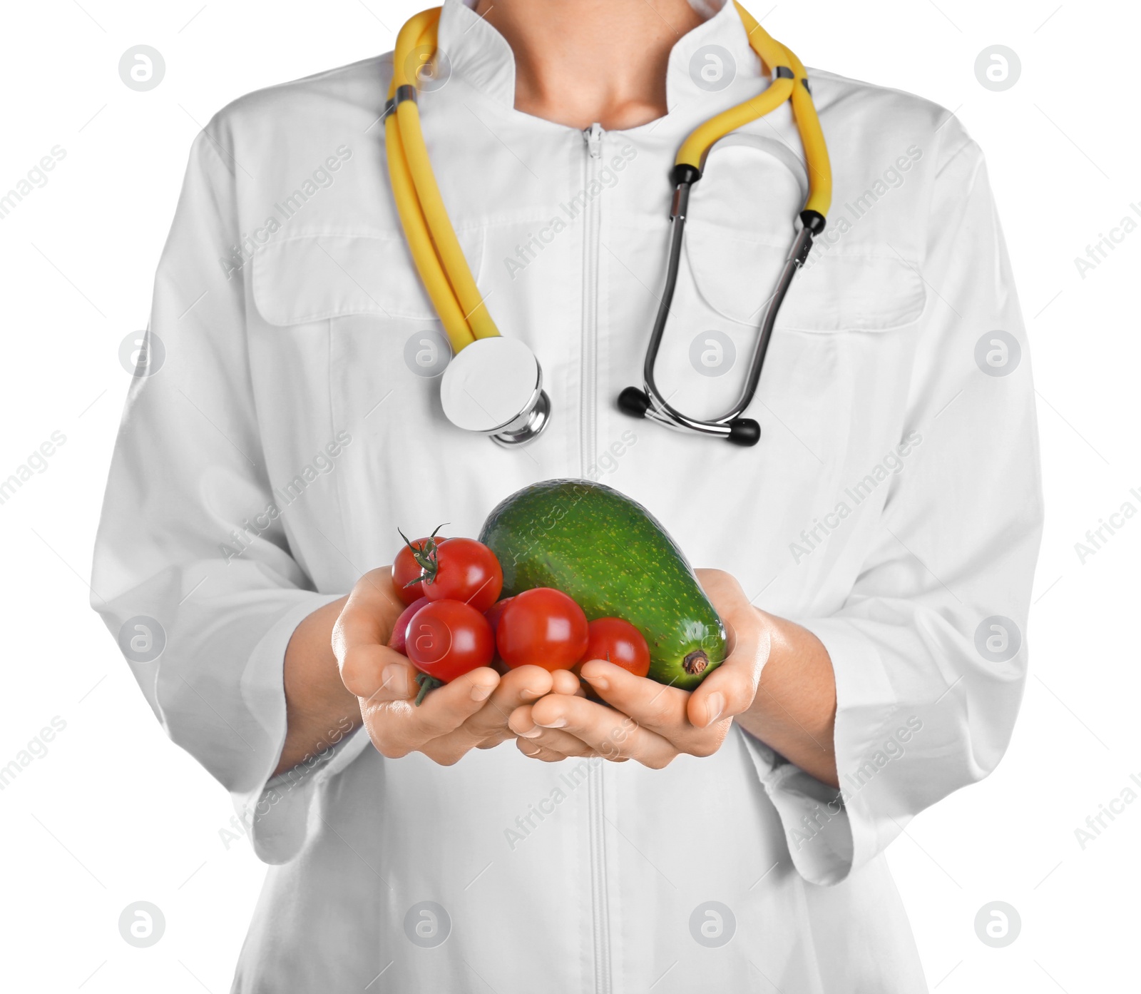 Photo of Female doctor with fresh products on white background. Cardiac diet